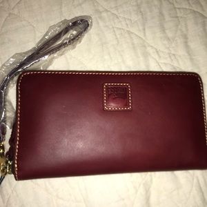 Dooney Florentine Bordeaux zip around wristlet